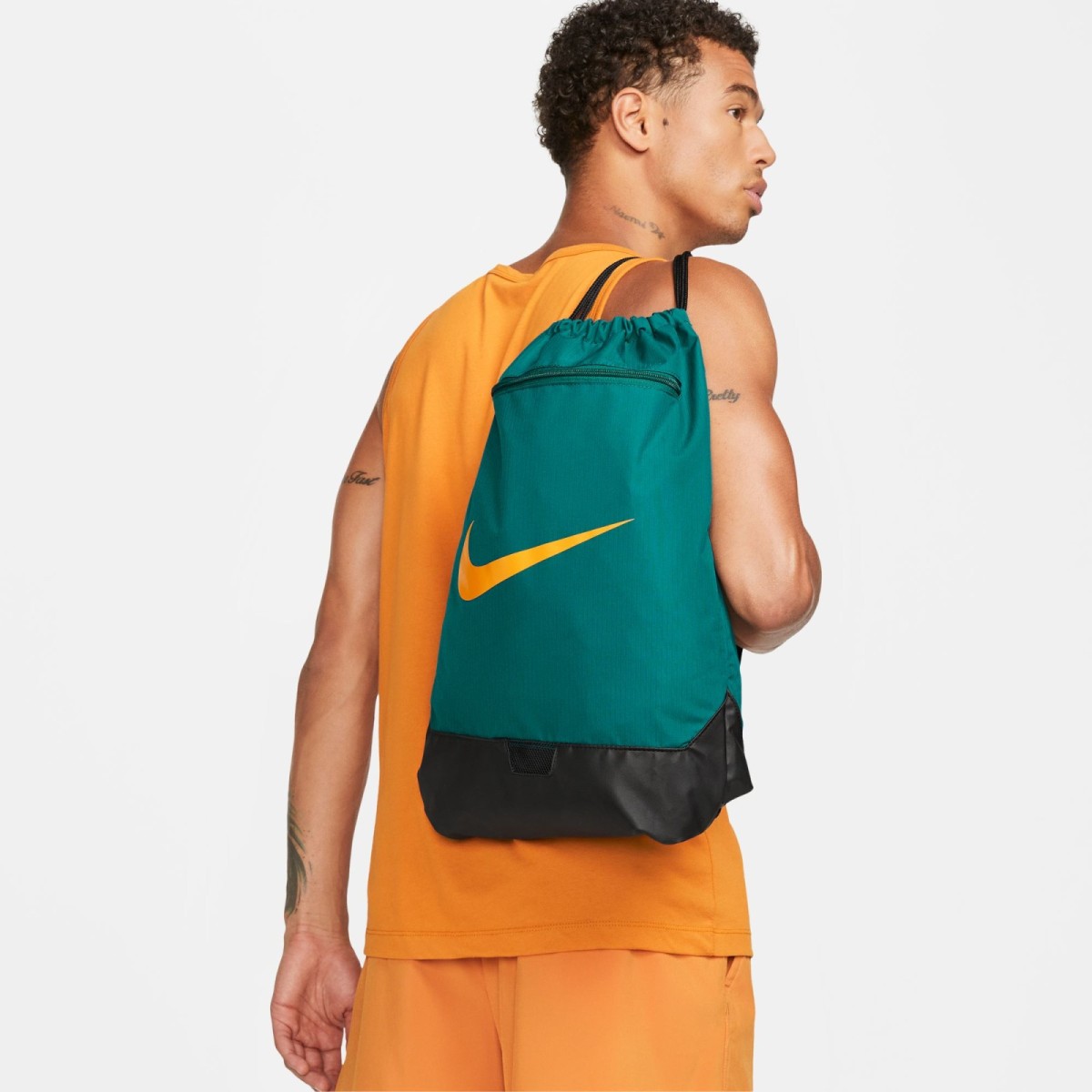 The Nike Brasilia Gym Sack features a minimal, lightweight design with ...