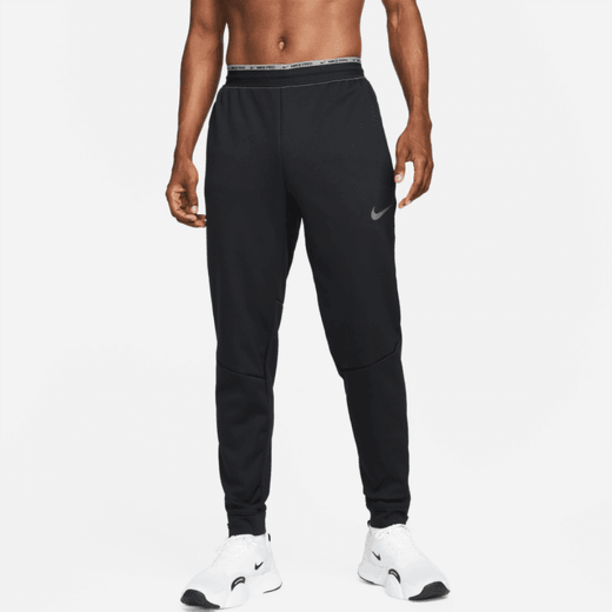 Nike Pro Therma-FIT Track Pants Black / Grey Shrug off the chill before and  after training or competing on cooler days in the Nike Pro Therma-FIT Pants.  Soft layered knit fabric teams